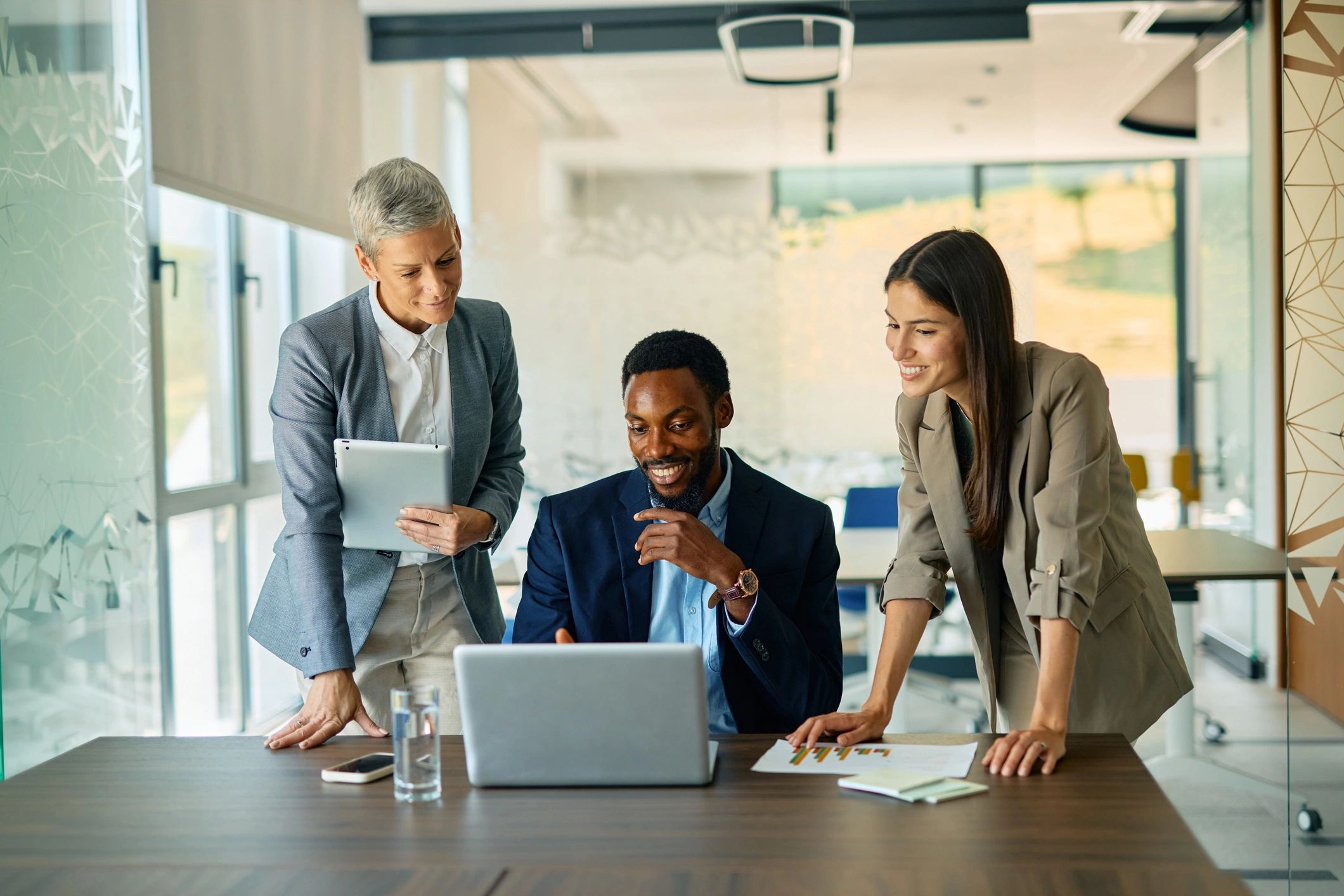 Technology consultants collaborating in a modern office